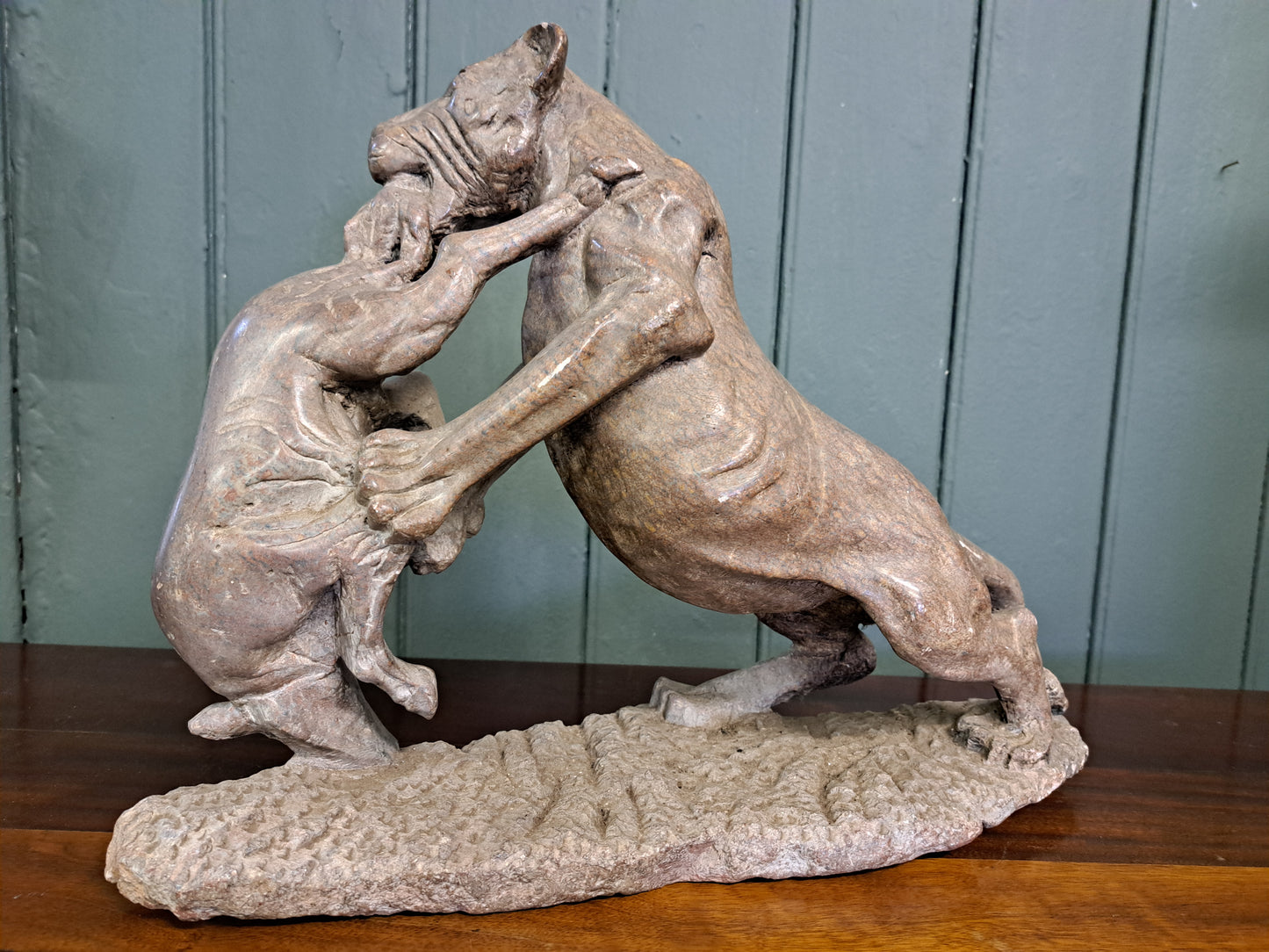Soapstone figurine of lion and prey