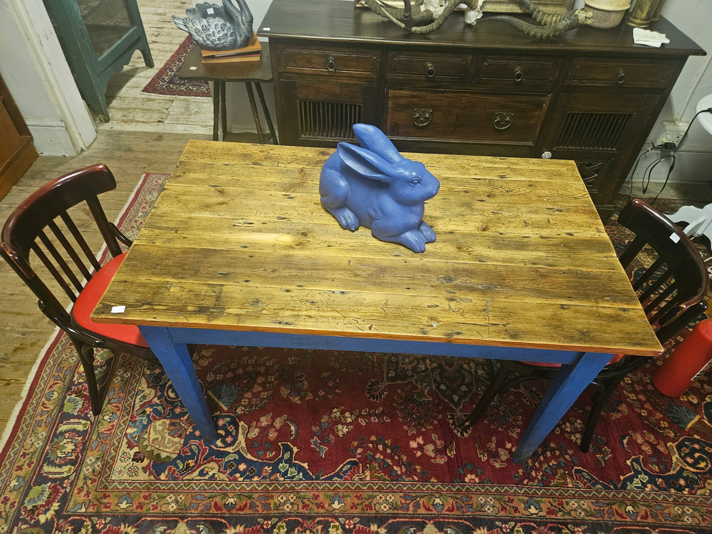 Rustic table with blue legs