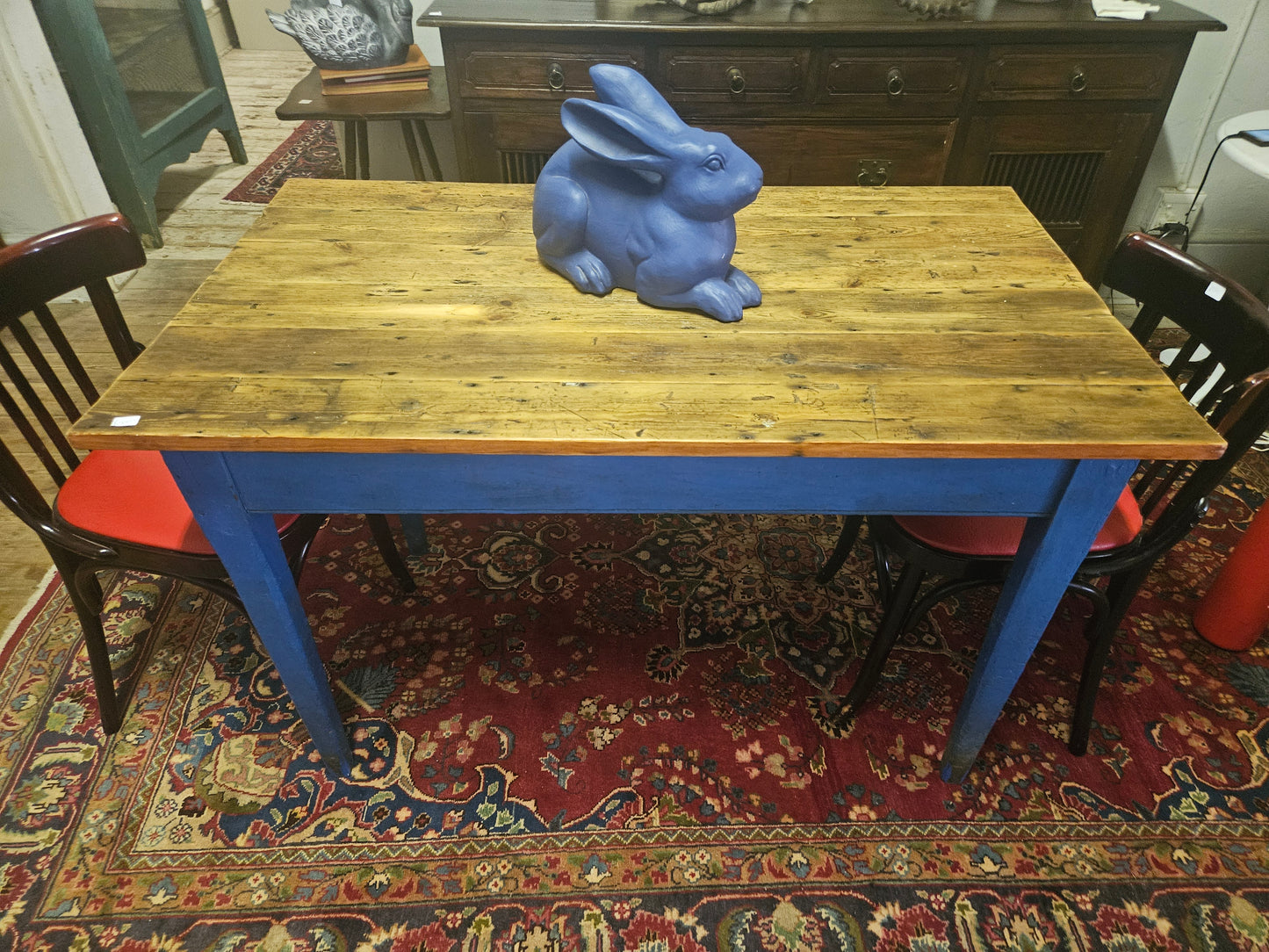 Rustic table with blue legs