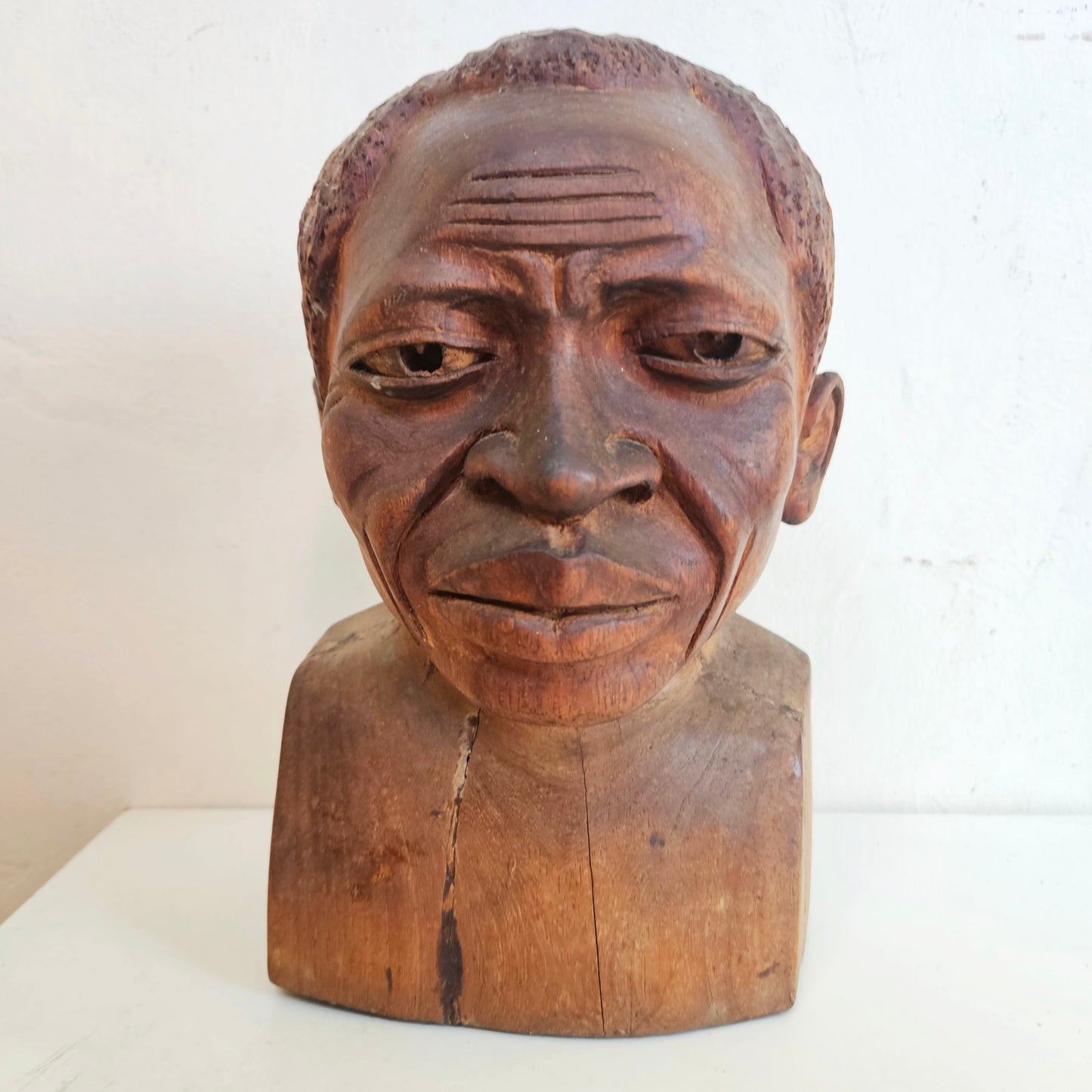 Carved wooden bust