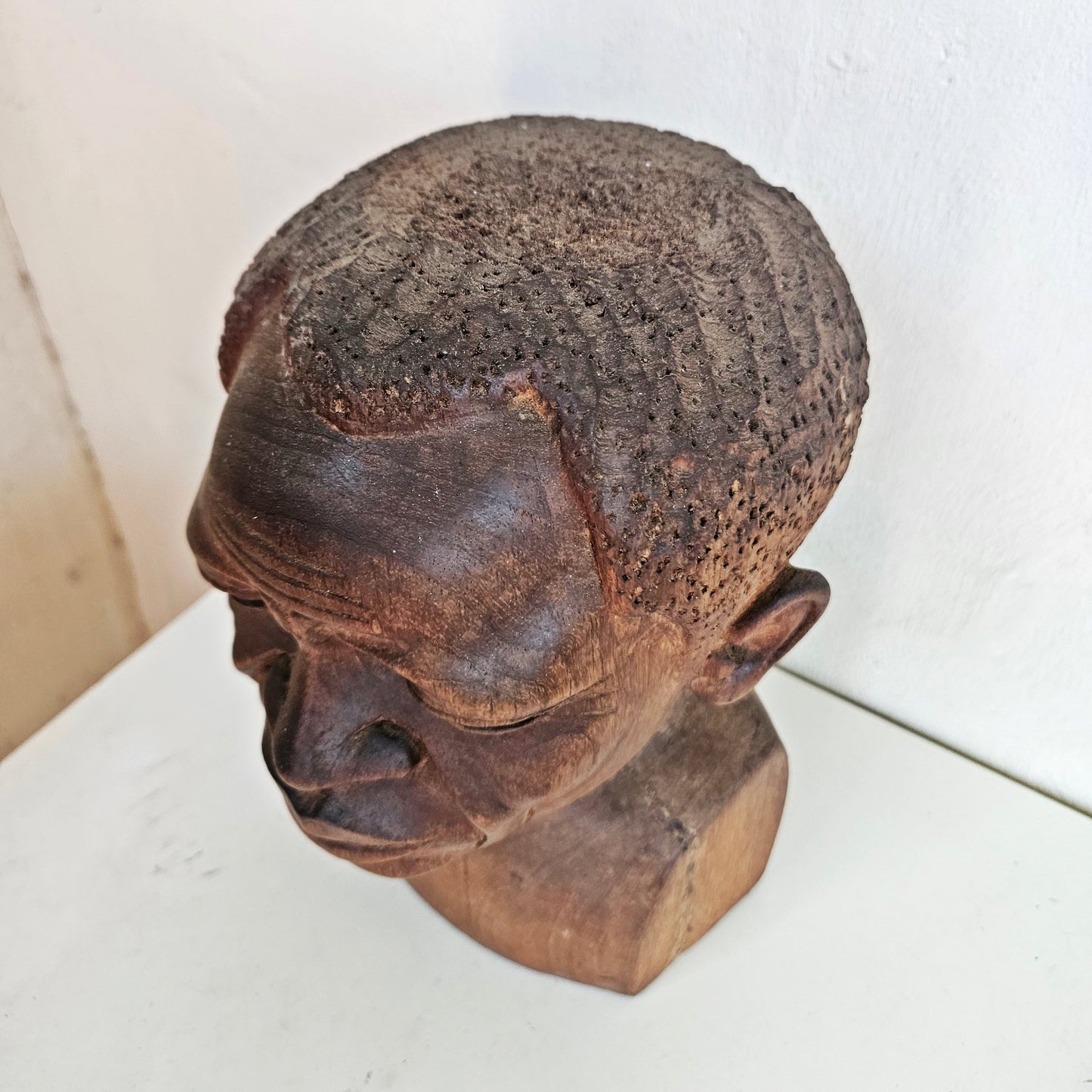 Carved wooden bust