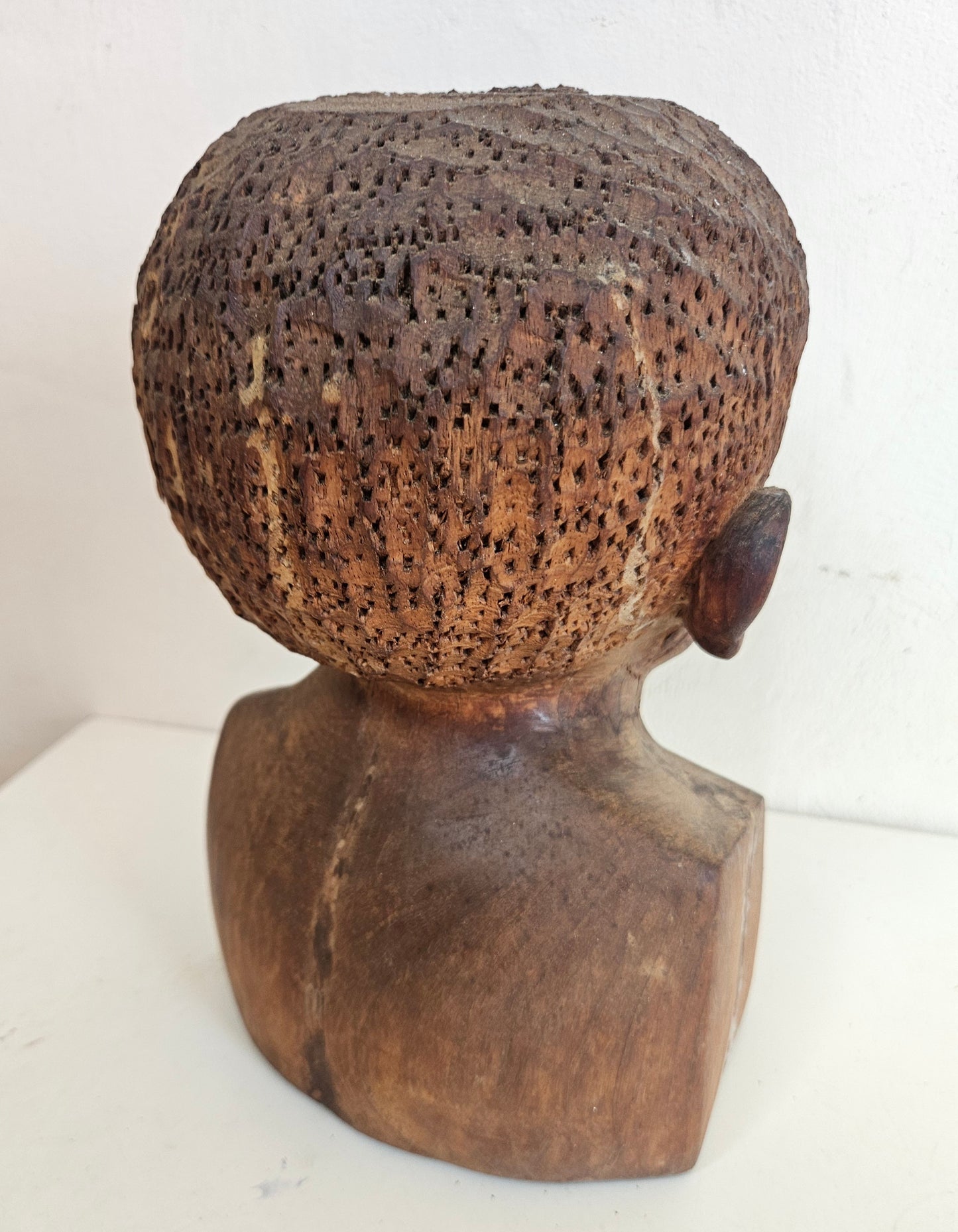 Carved wooden bust