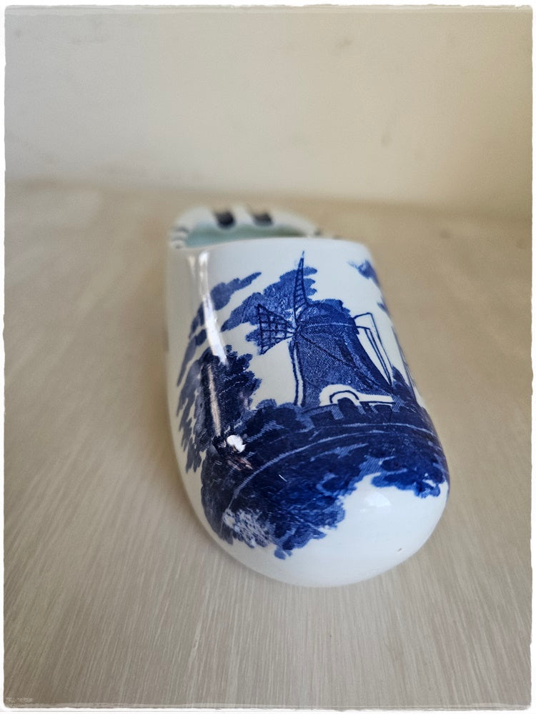 2 blue and white shoe ashtrays