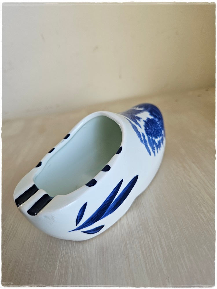 2 blue and white shoe ashtrays