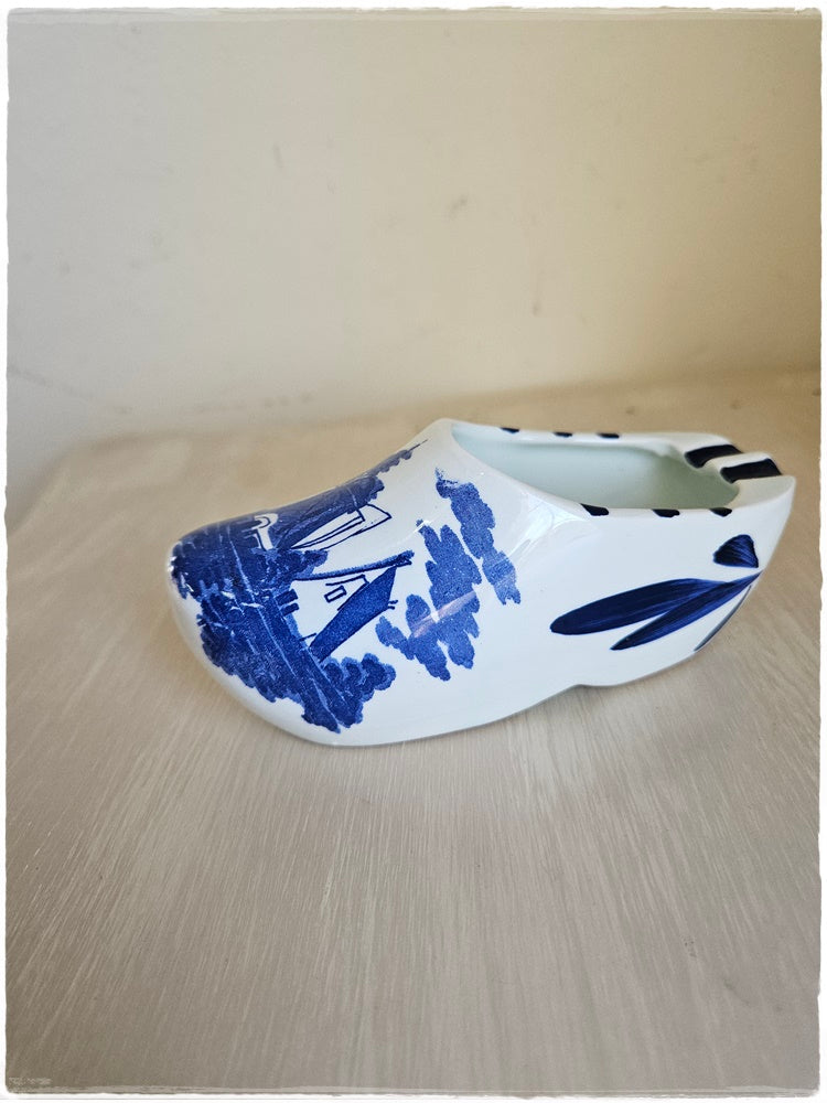 2 blue and white shoe ashtrays