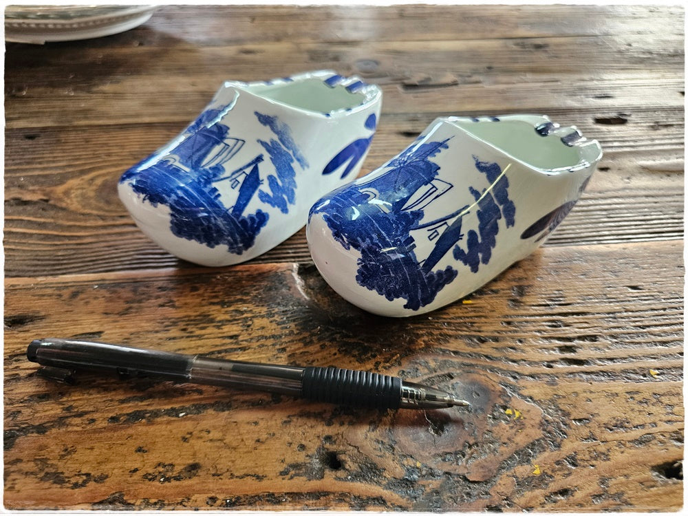 2 blue and white shoe ashtrays