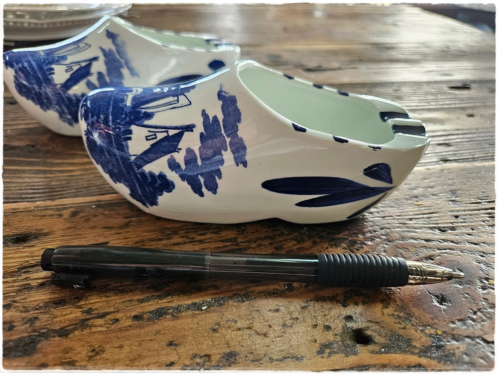 2 blue and white shoe ashtrays