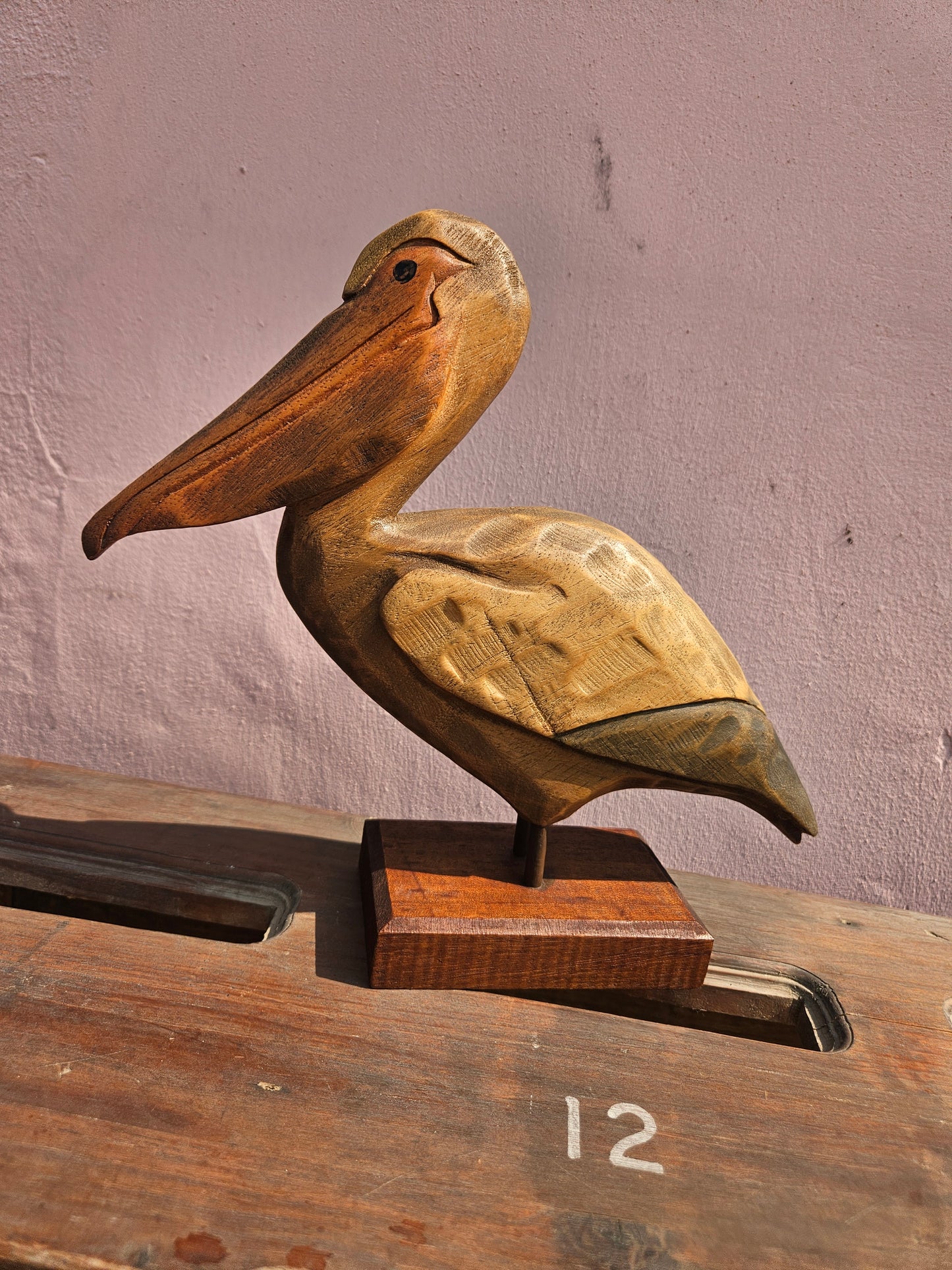 Pair of wooden bird figurines
