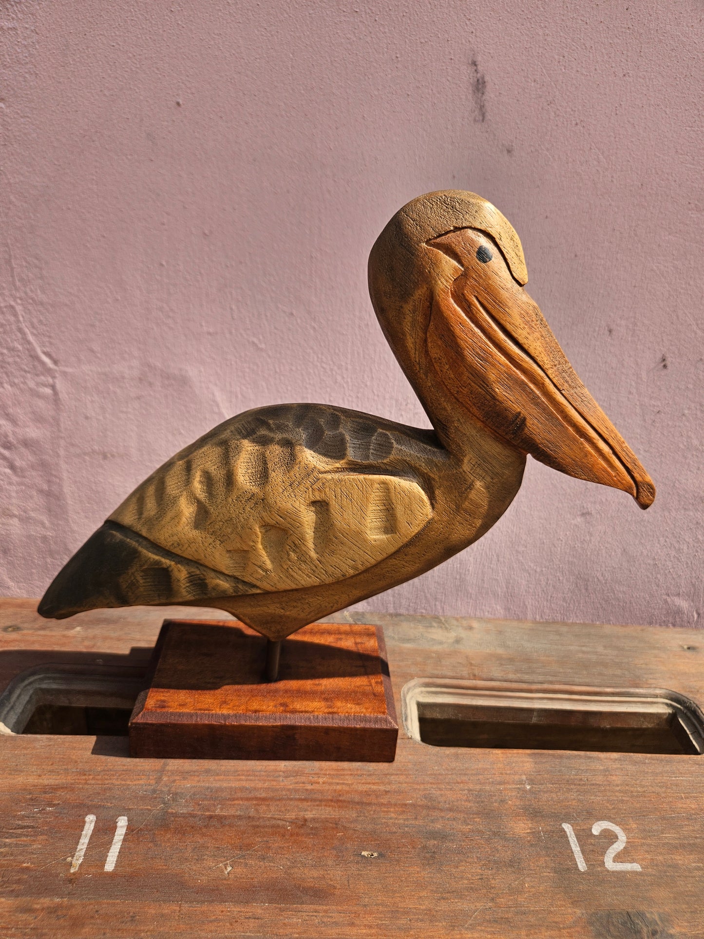 Pair of wooden bird figurines