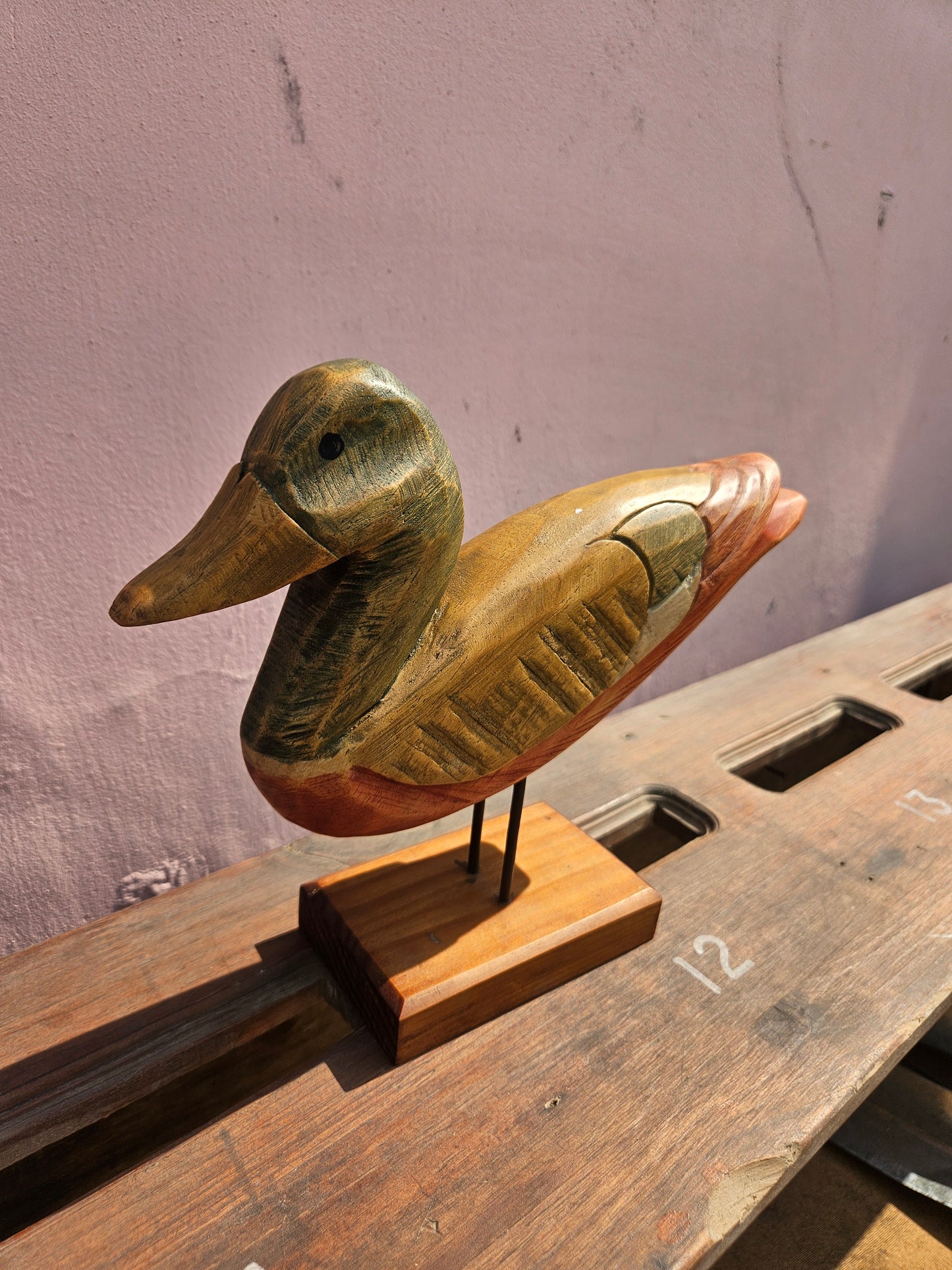 Pair of wooden bird figurines