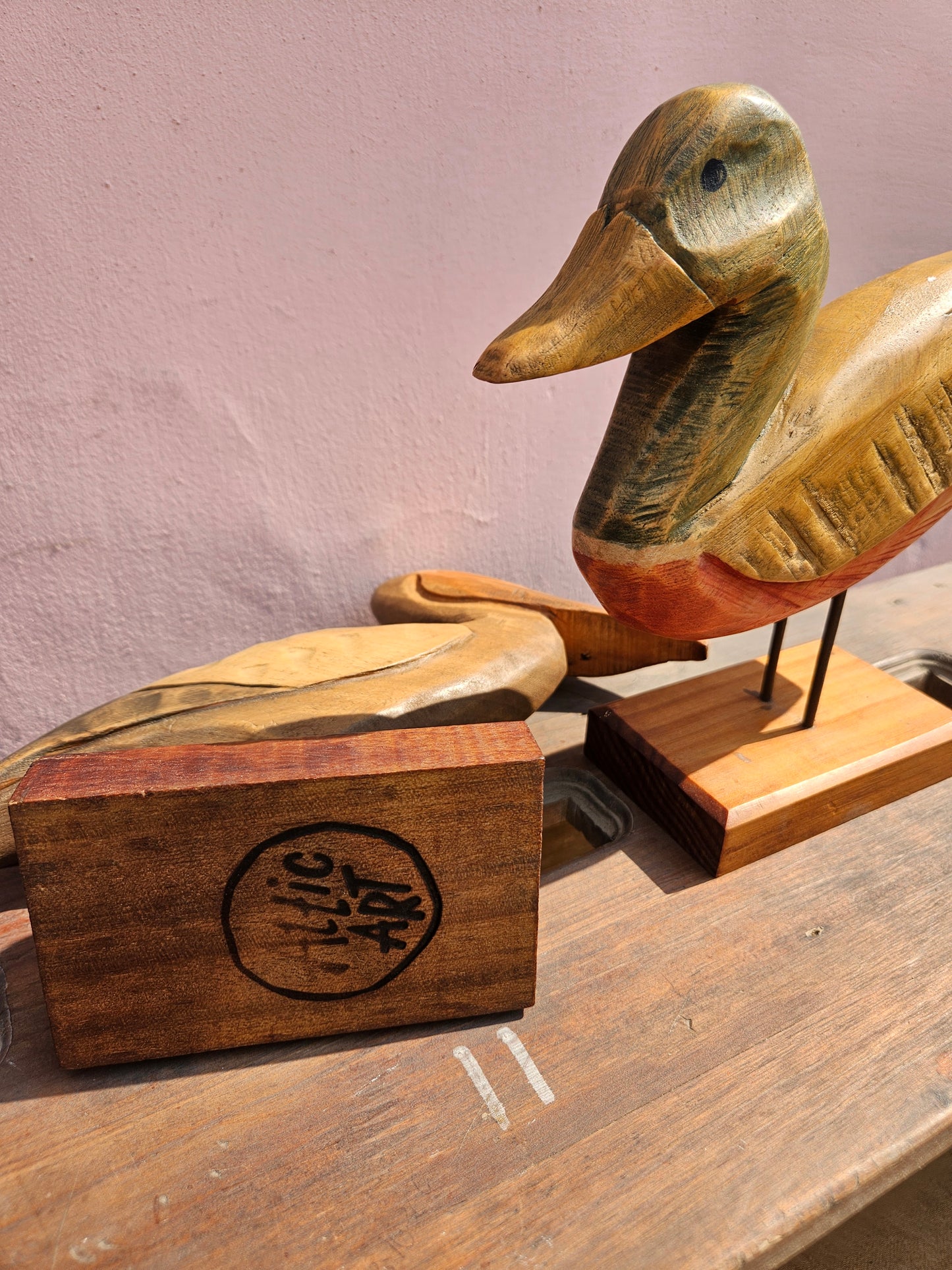 Pair of wooden bird figurines