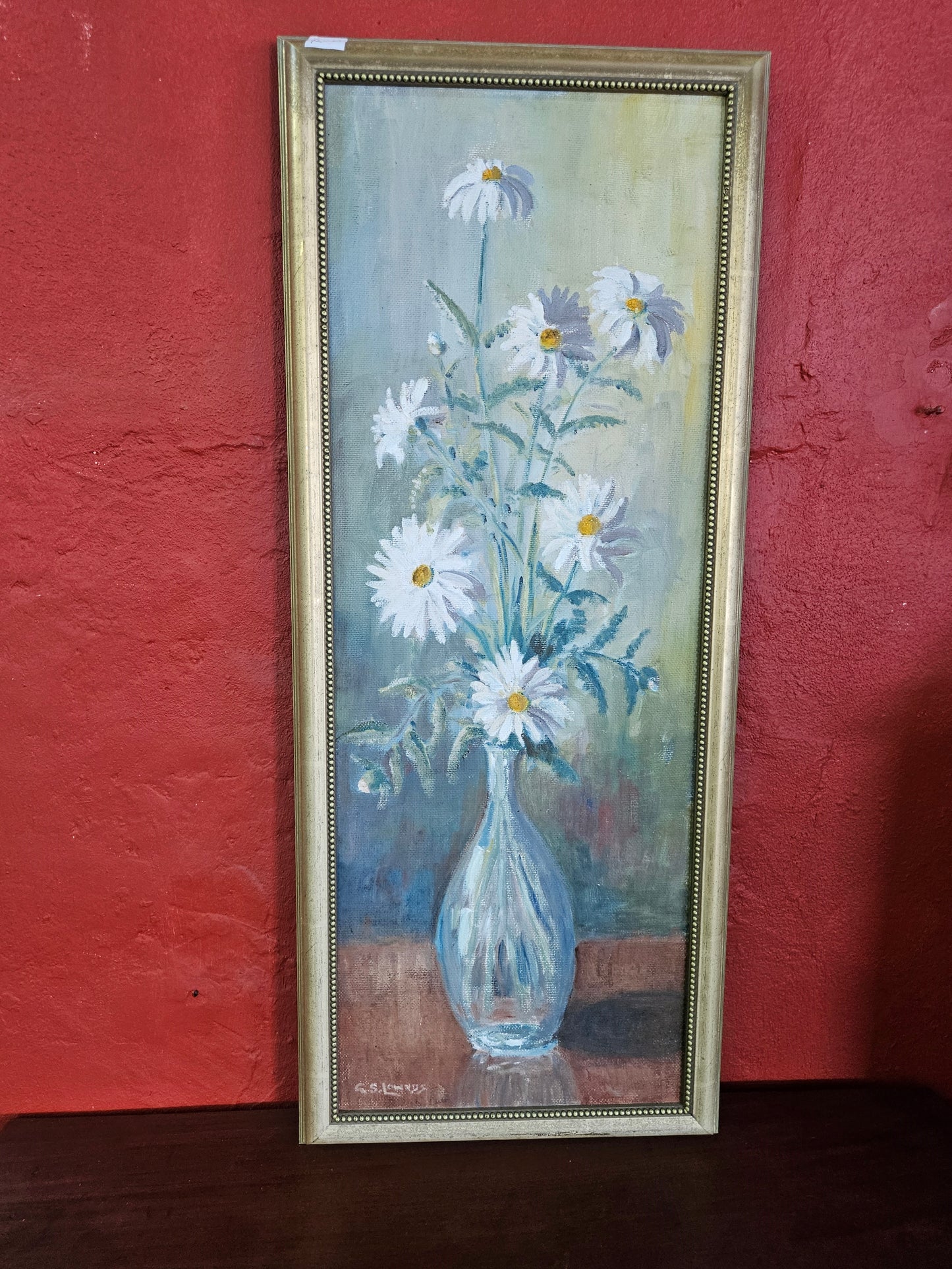 Still life painting of daisies in a vase