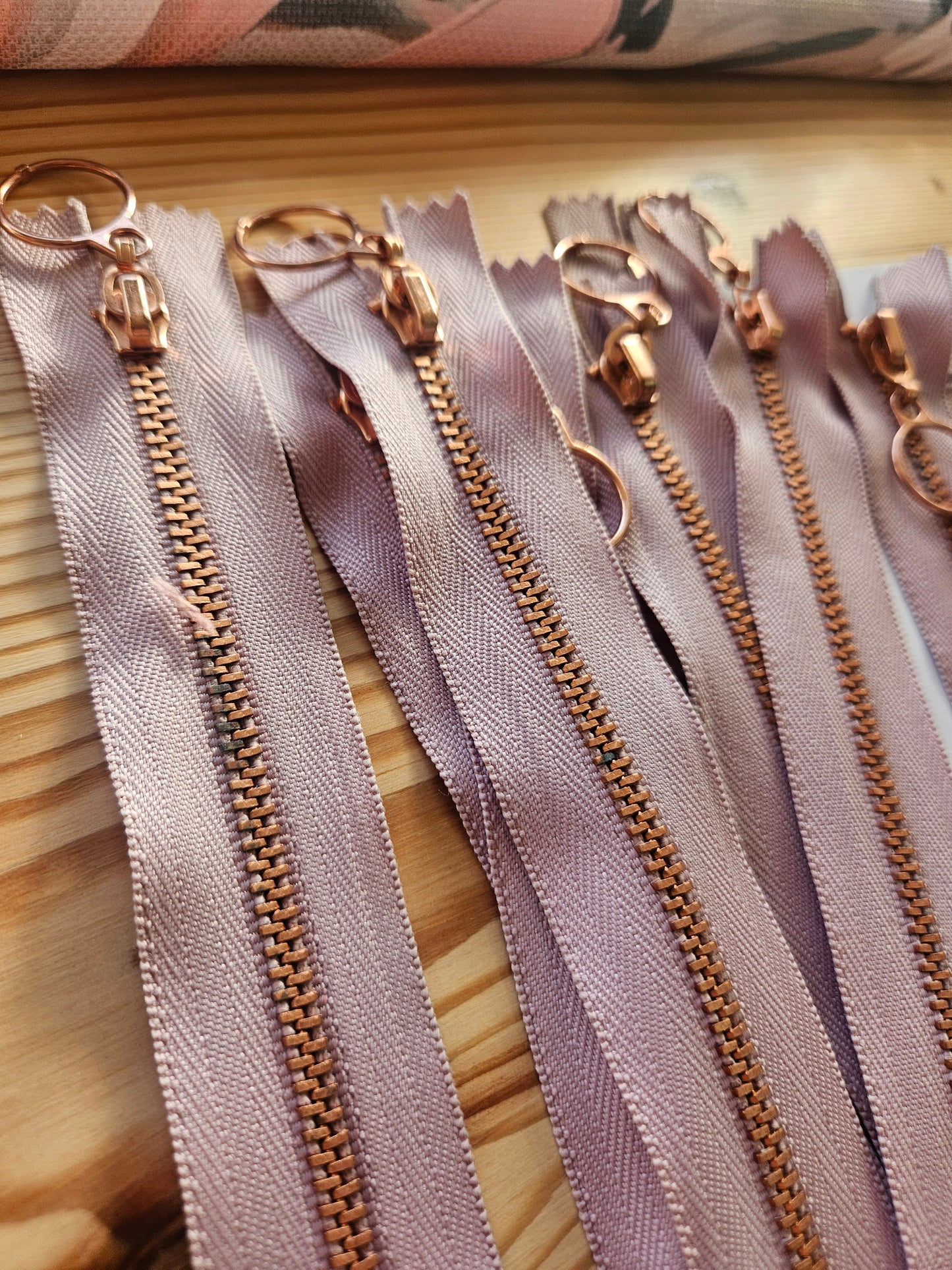 Rose gold and mauve zips