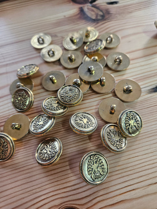 Gold plastic buttons