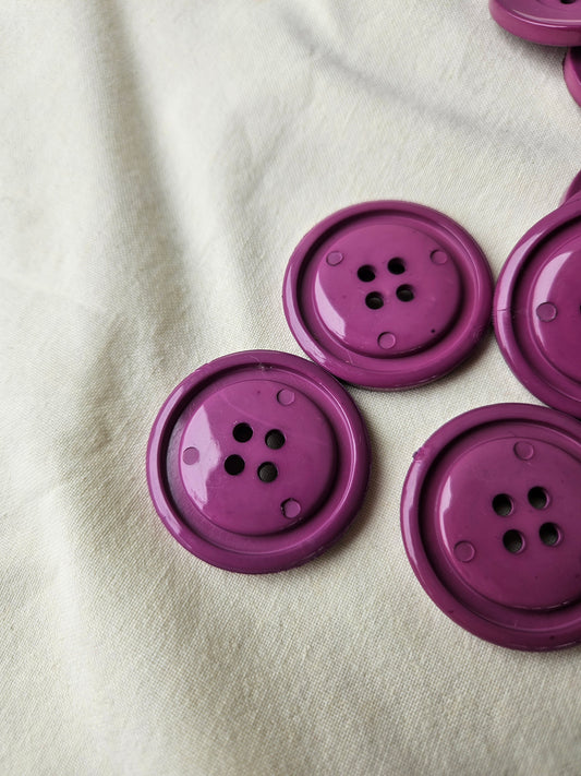 Large purple buttons
