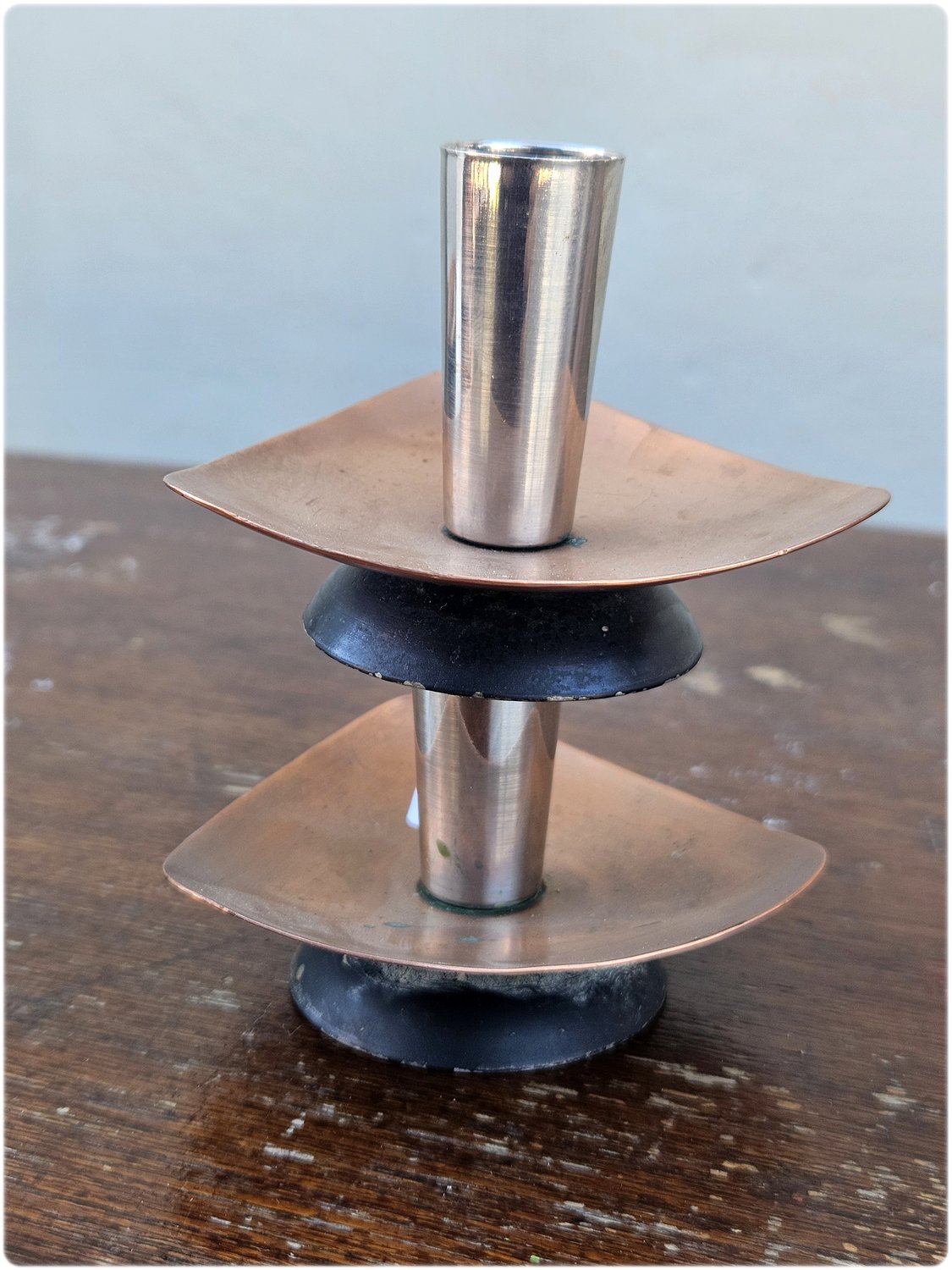 Pair of mid-century copper and stainless steel candlesticks