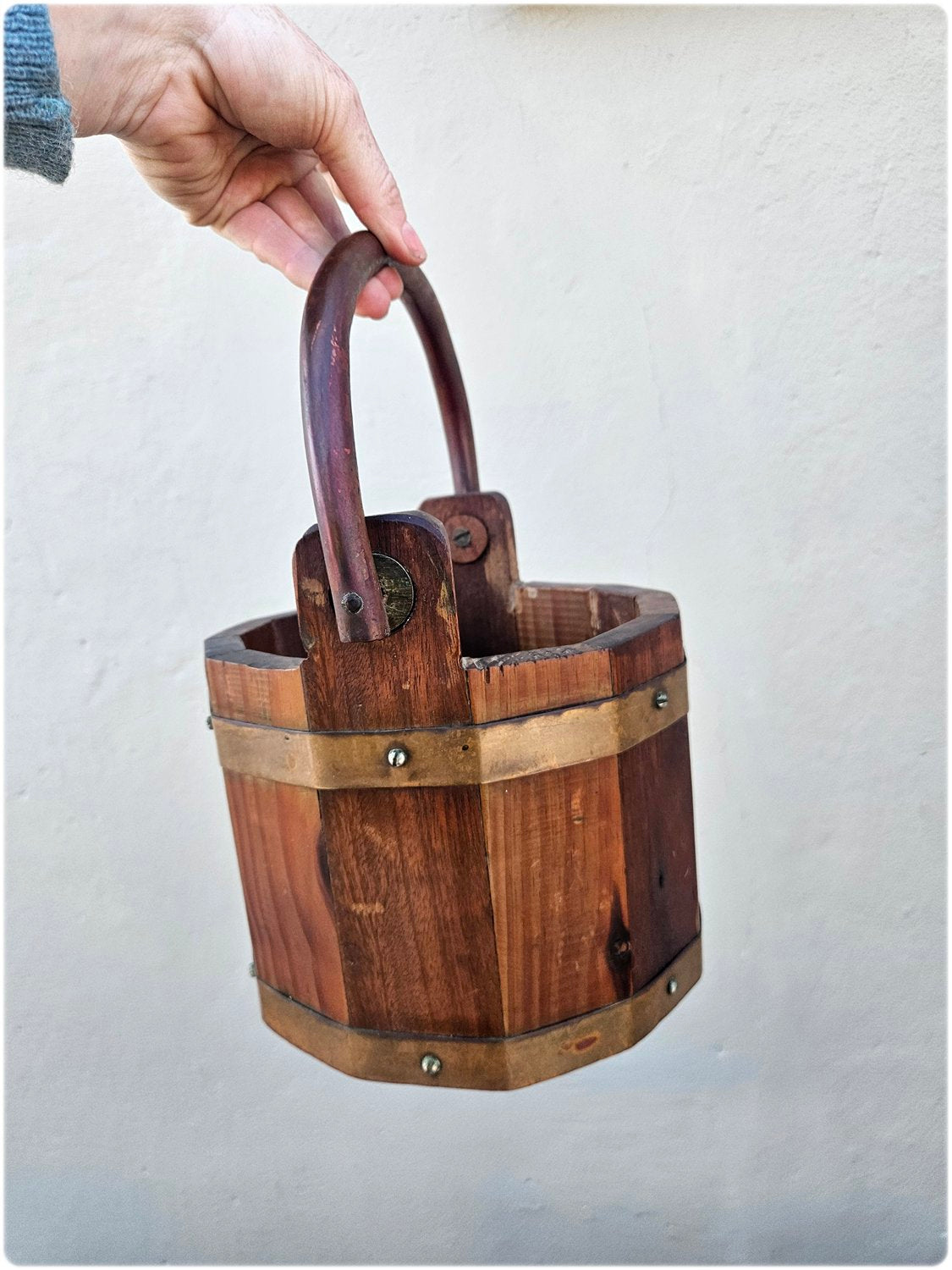 Wooden bucket with copper details