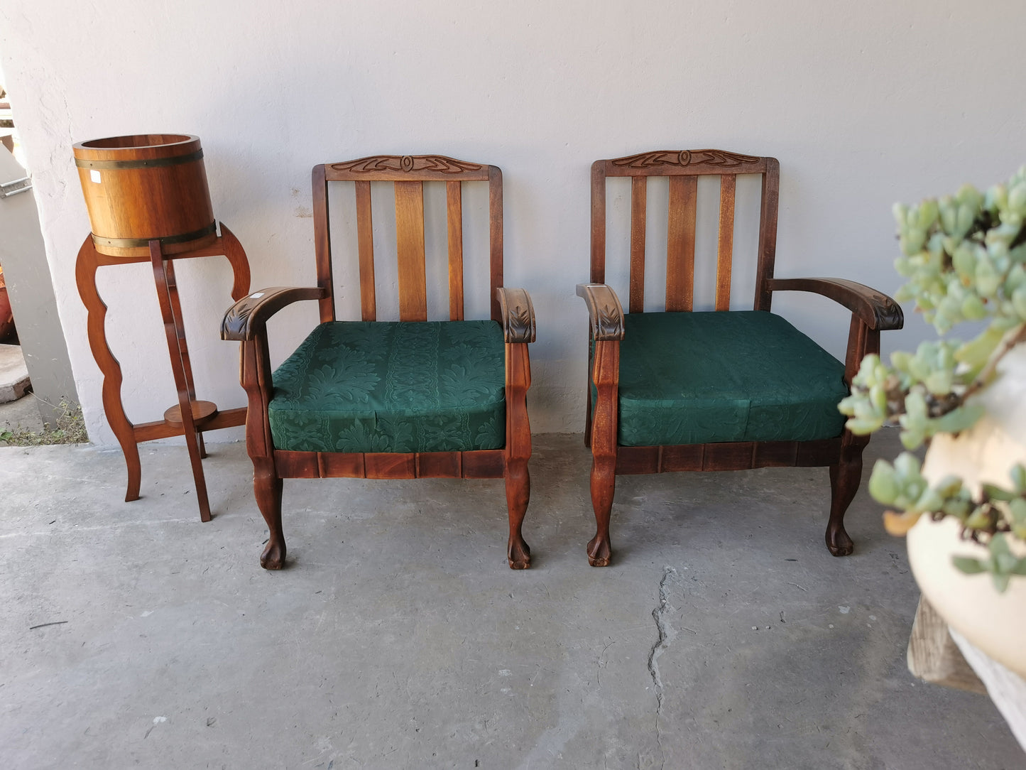 Pair of wooden arm chairs