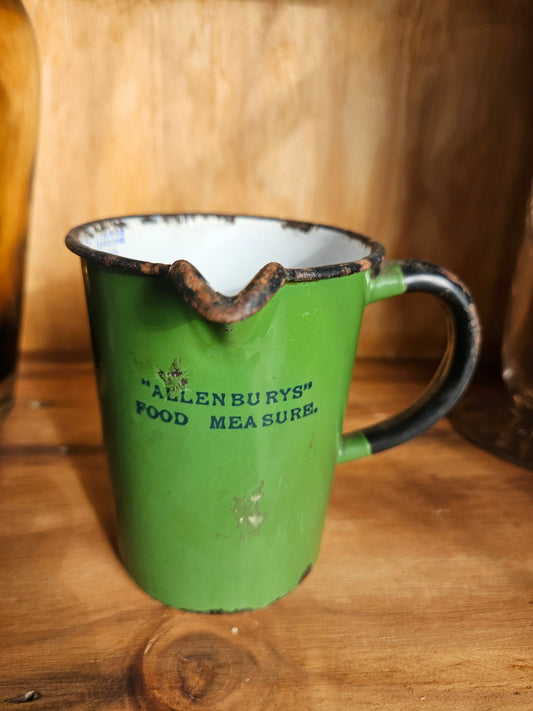 Green enamel measuring jug