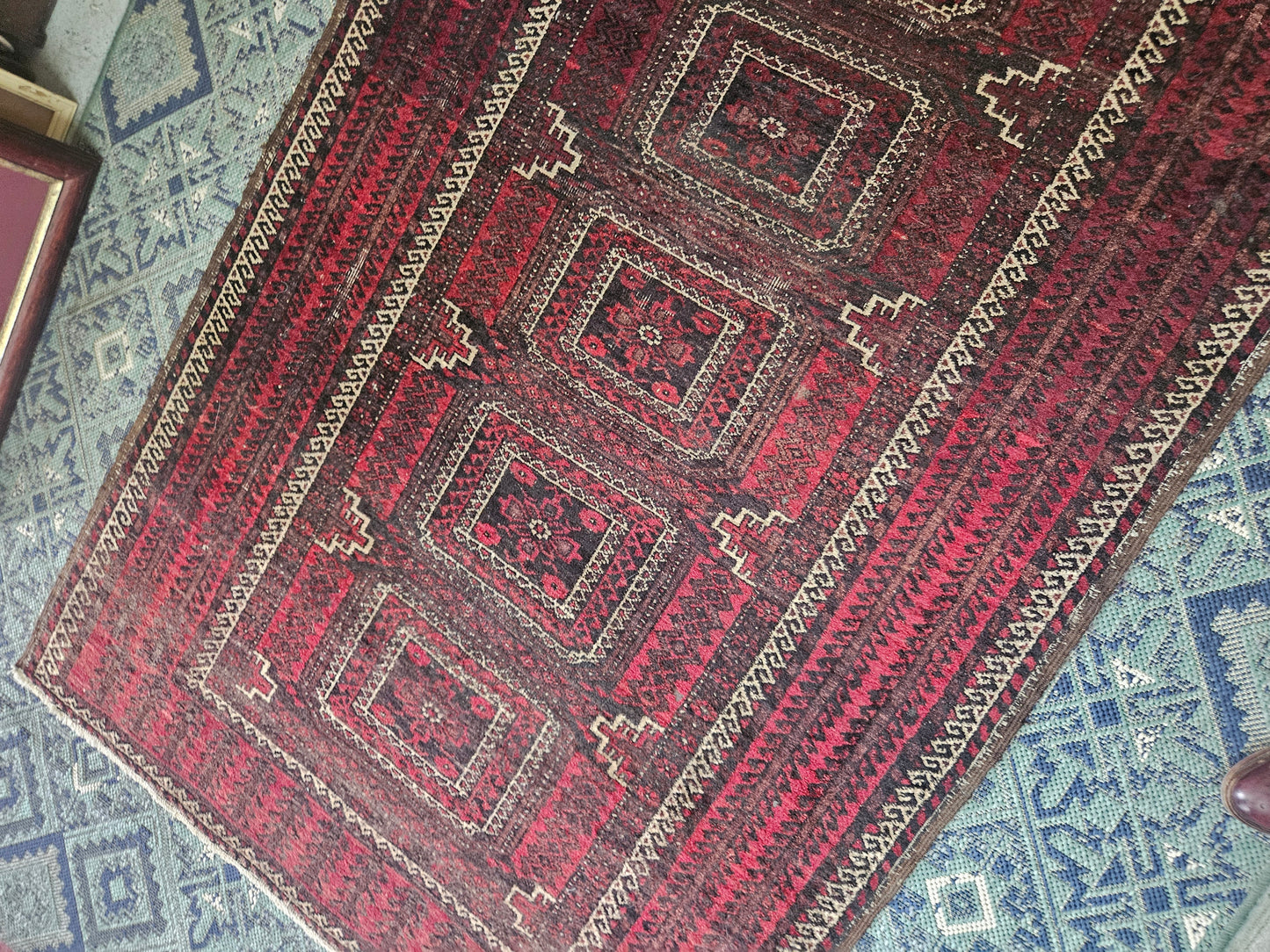 Worn Persian carpet