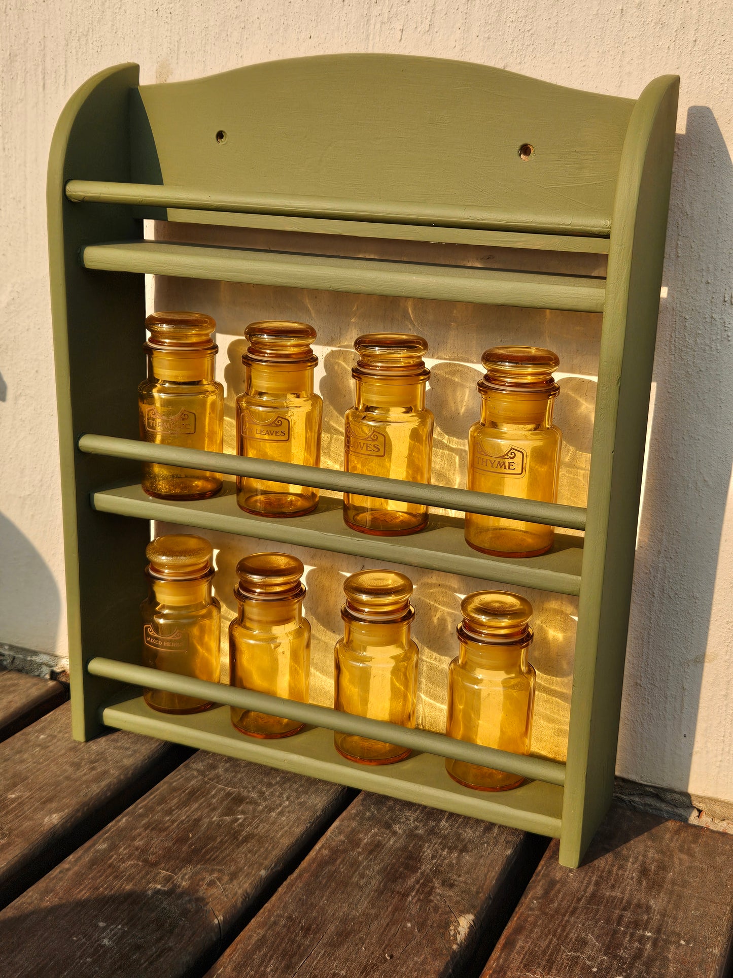 Spice bottles on rack
