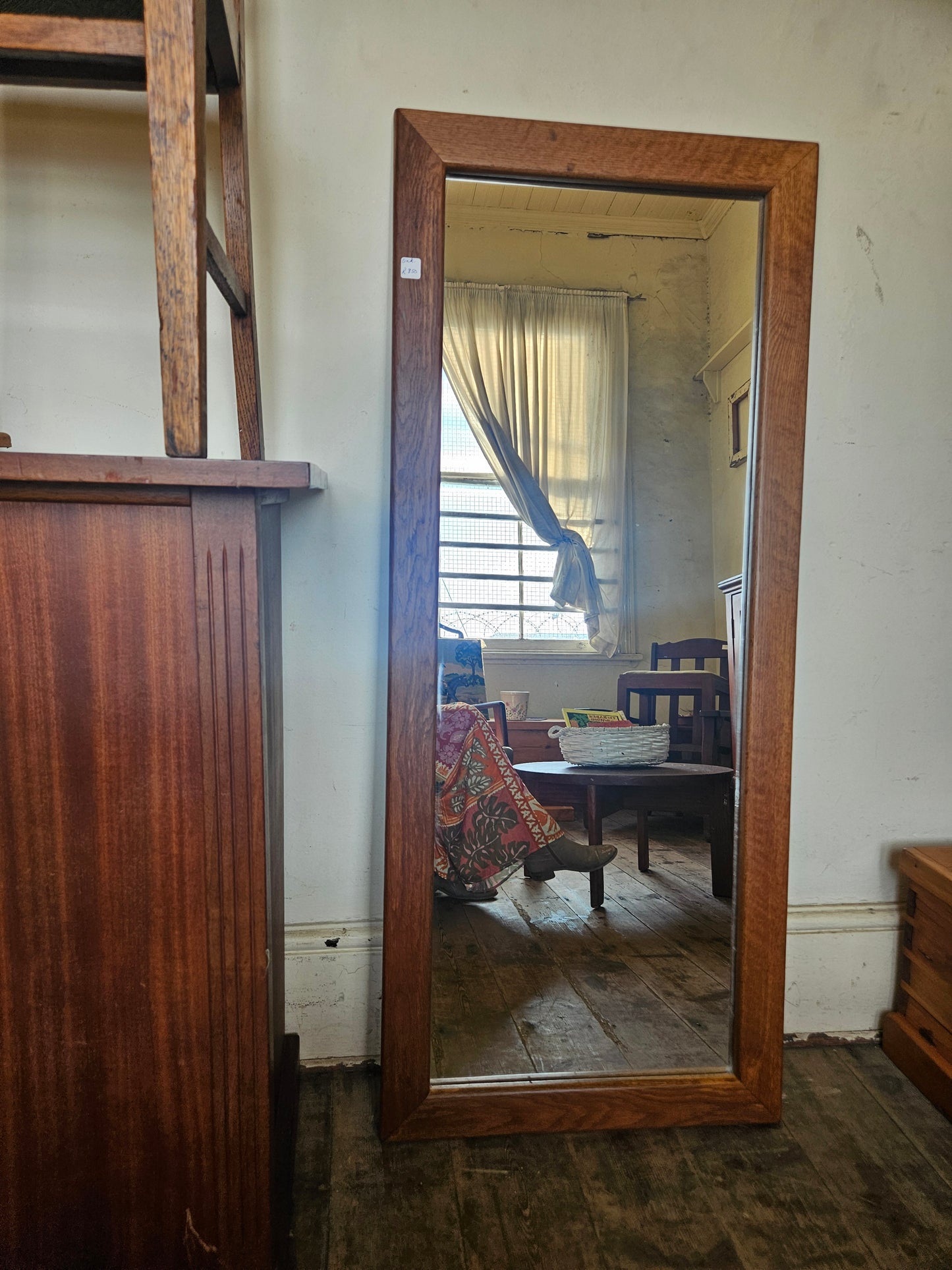Long oak framed mirror
