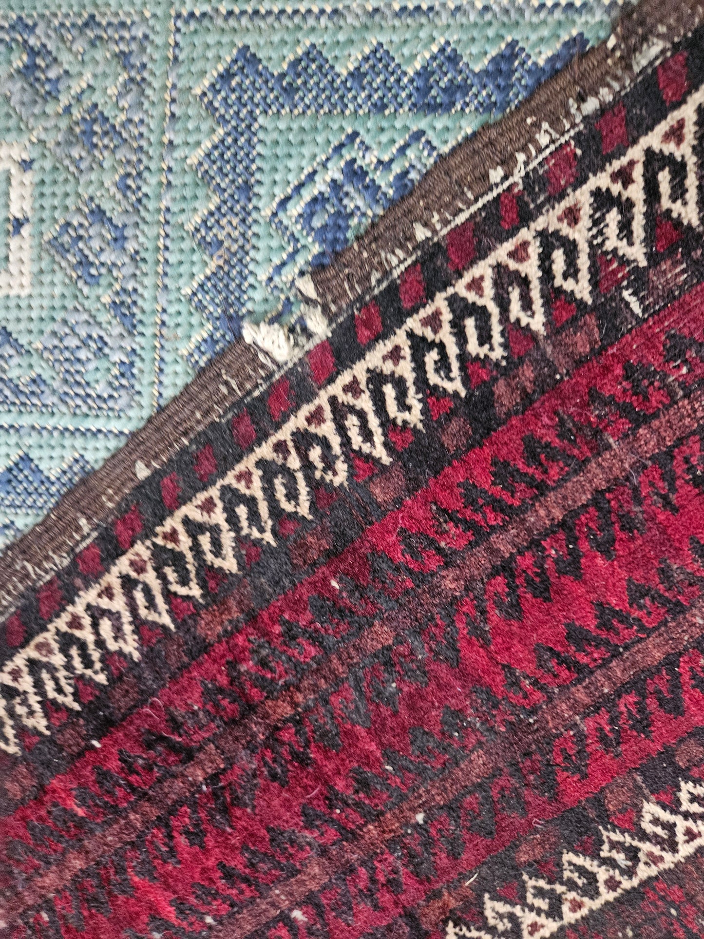 Worn Persian carpet