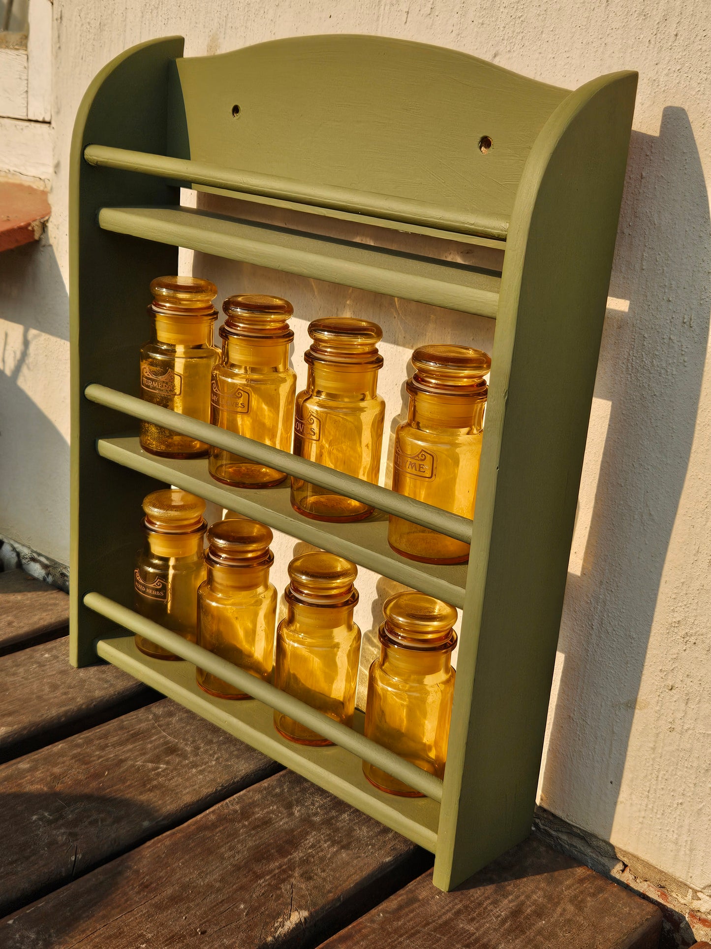 Spice bottles on rack
