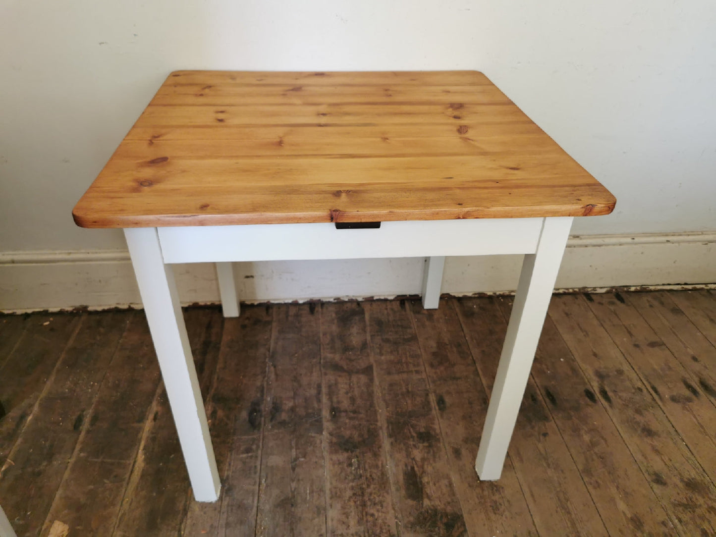 Square table with painted legs
