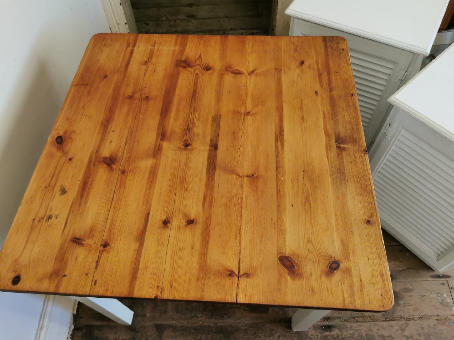 Square table with painted legs