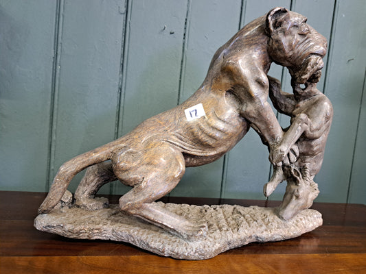 Soapstone figurine of lion and prey