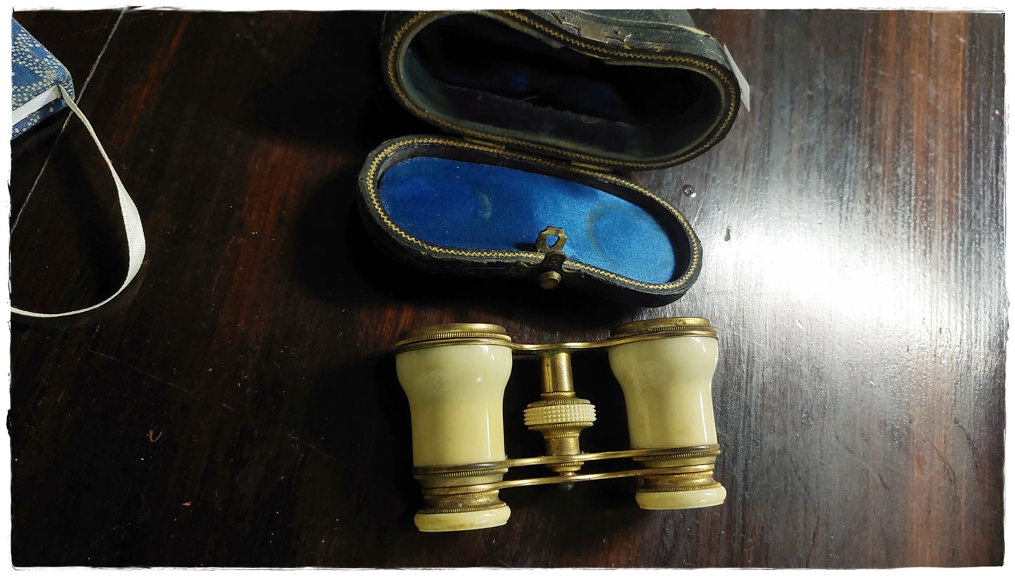 Small brass and Ivory binoculars