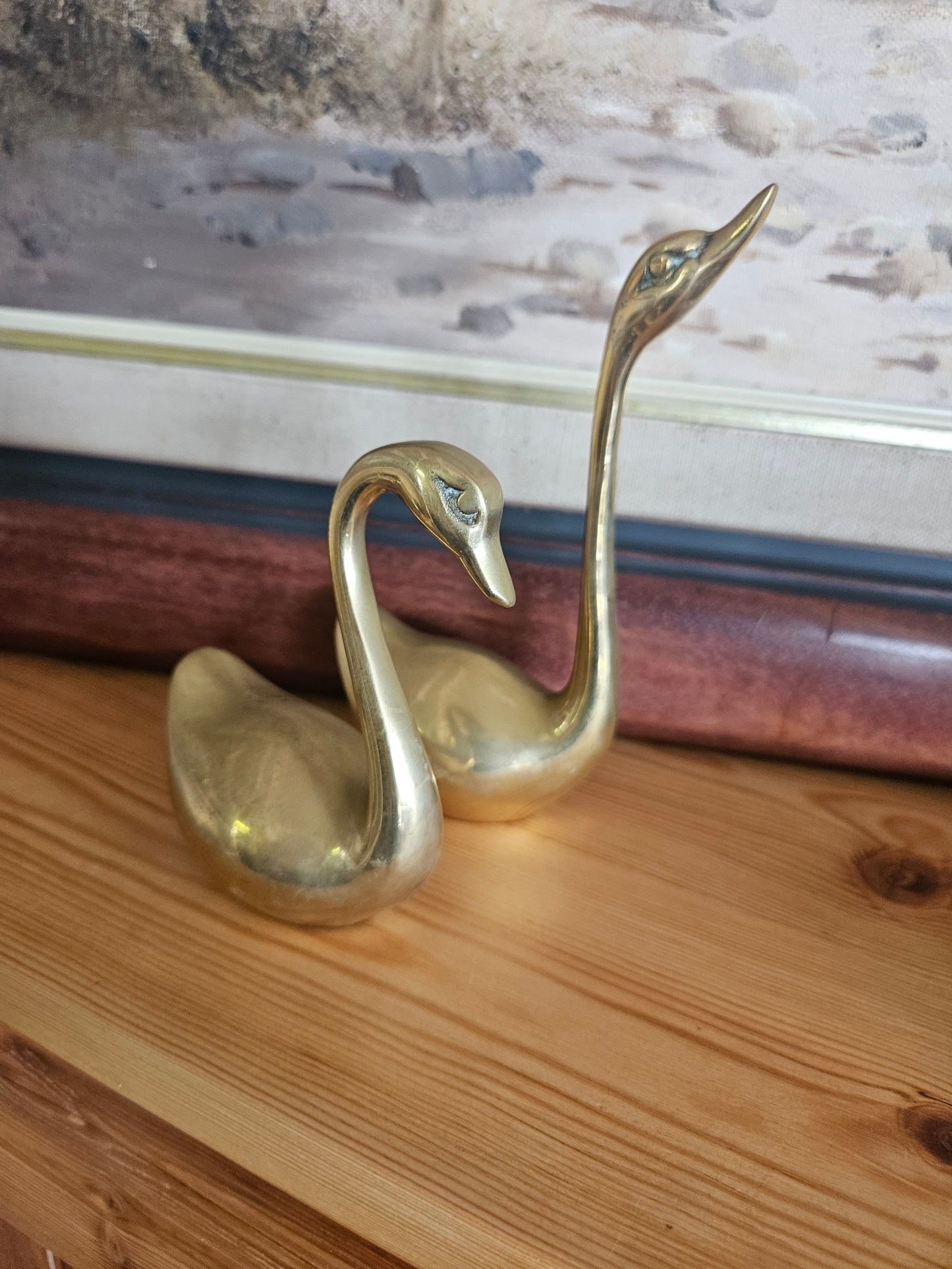 Pair of brass swans