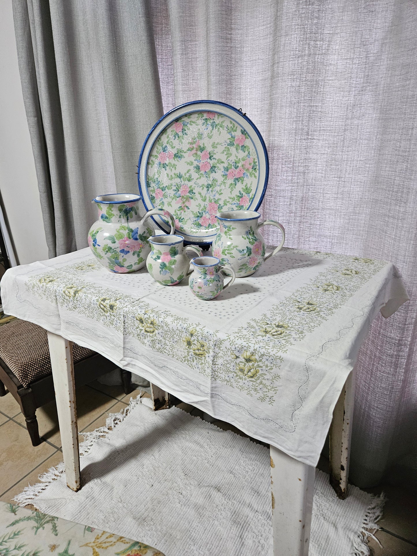 Floral pottery plate and jugs