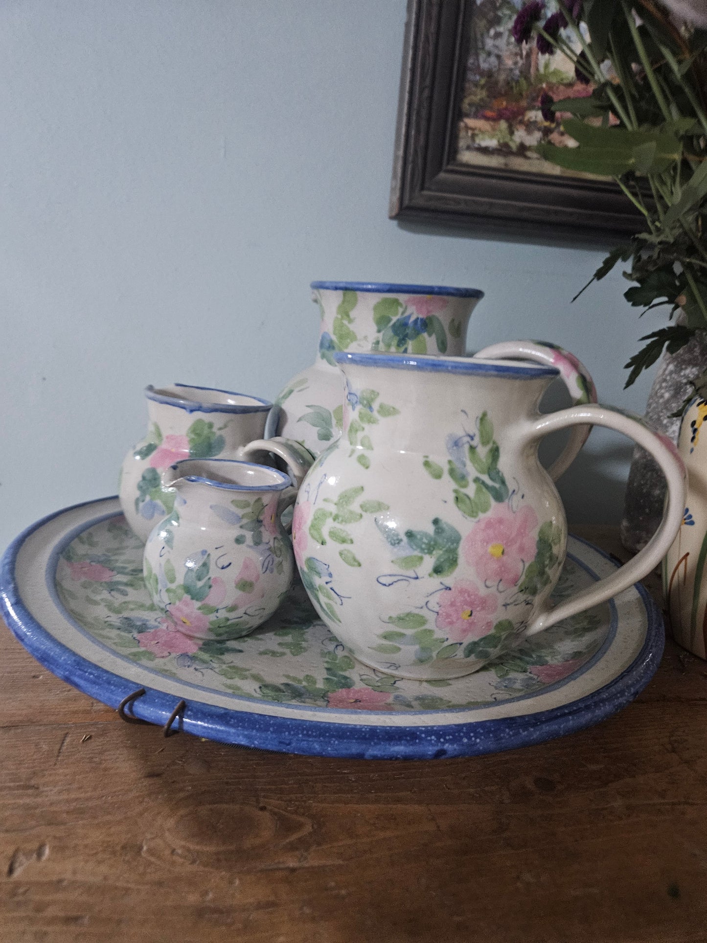 Floral pottery plate and jugs