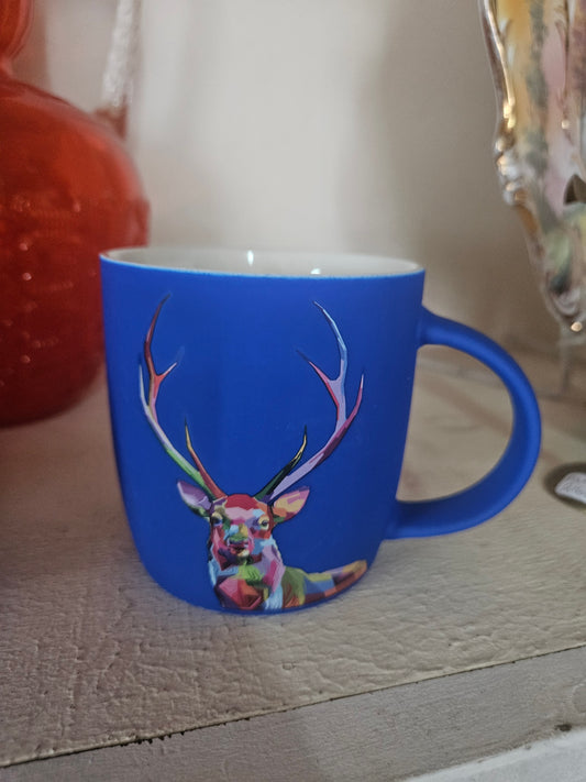 Blue mug with abstract deer