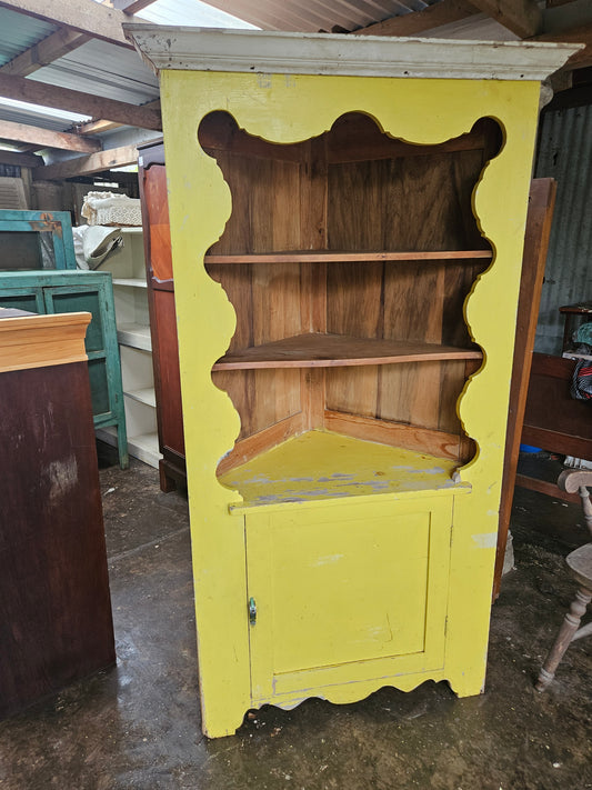 Antique yellow corner cabinet