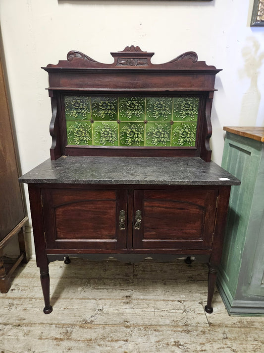Washstand with green tiles