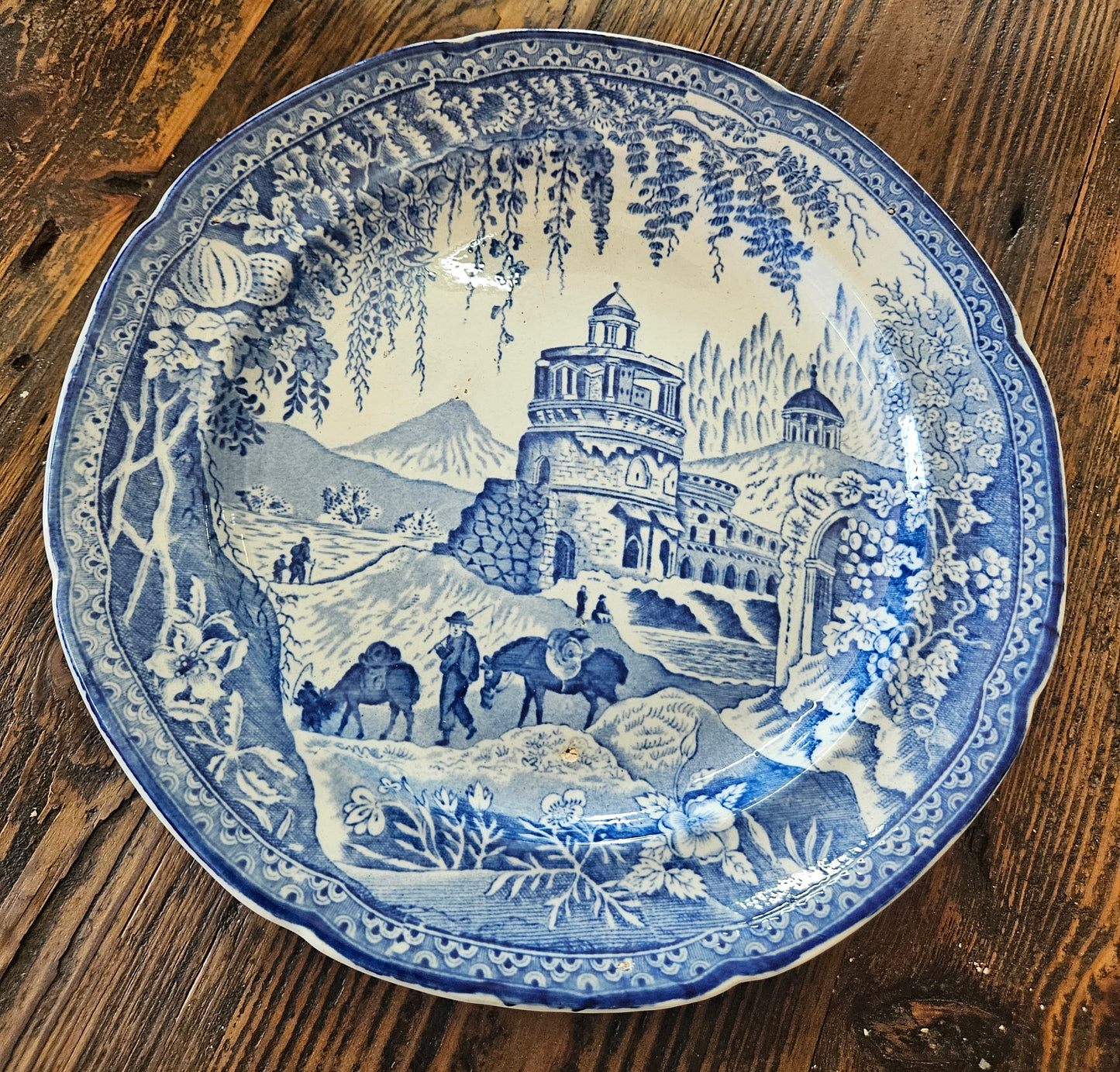 Blue and white plate with horse