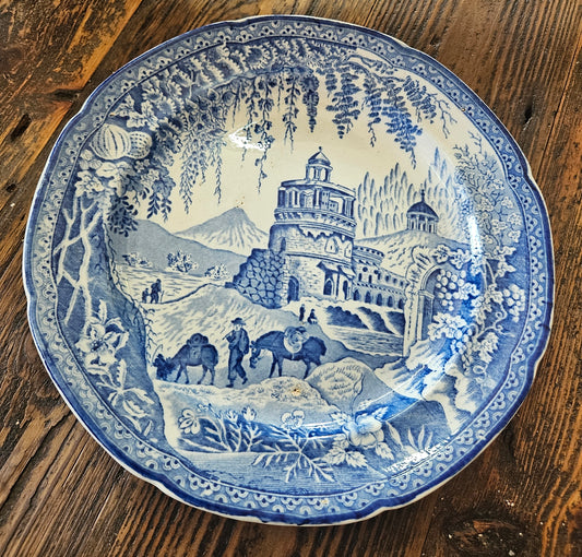 Blue and white plate with horse