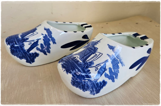 2 blue and white shoe ashtrays