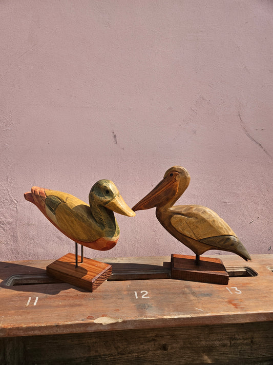 Pair of wooden bird figurines