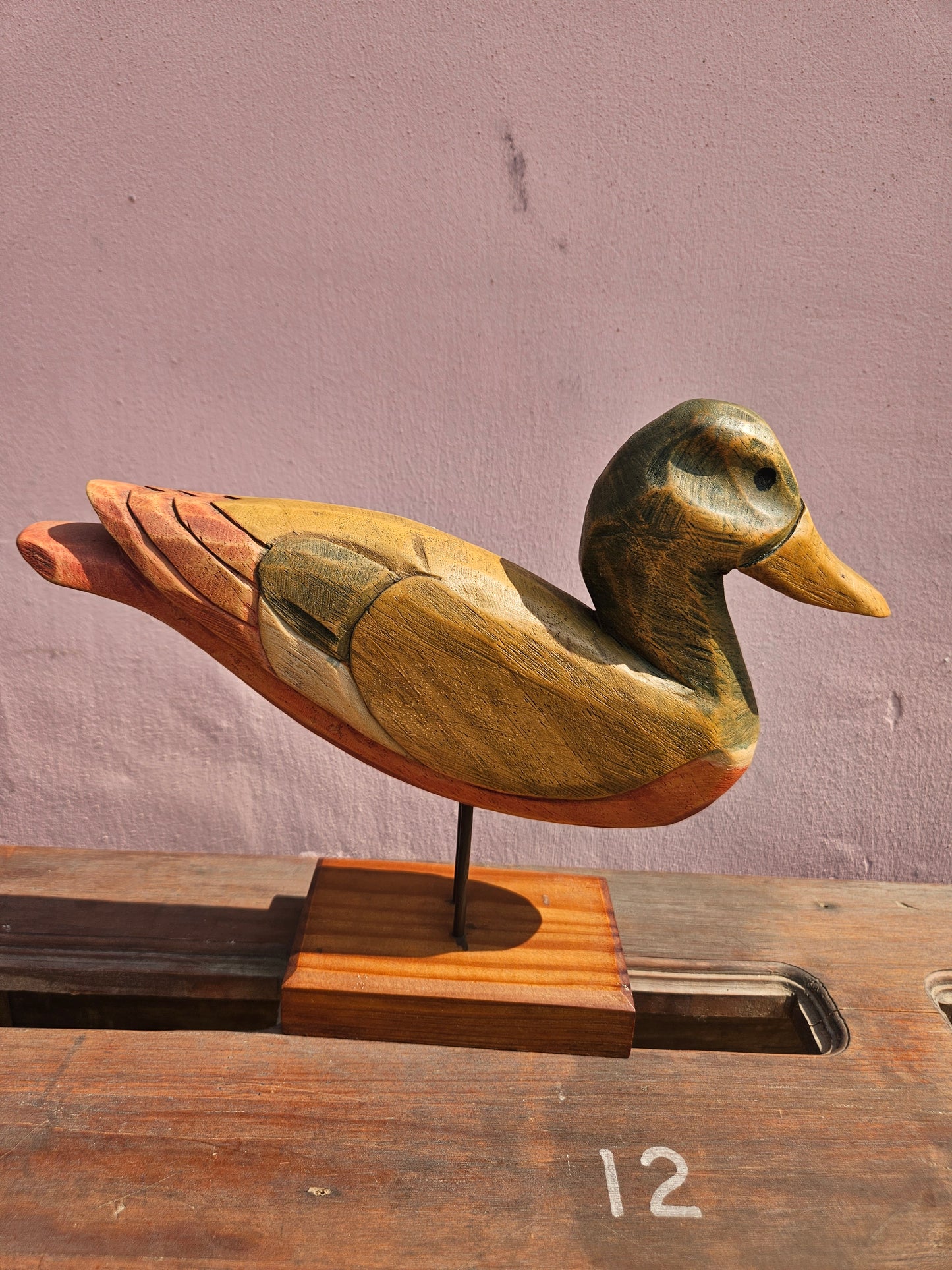 Pair of wooden bird figurines