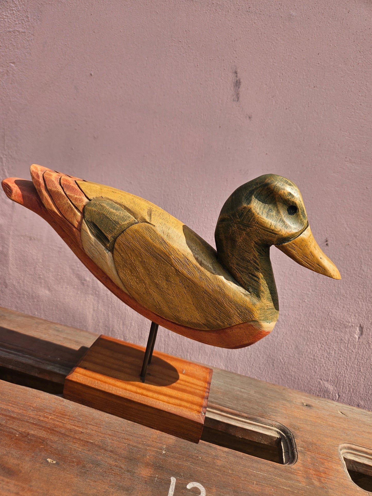 Pair of wooden bird figurines