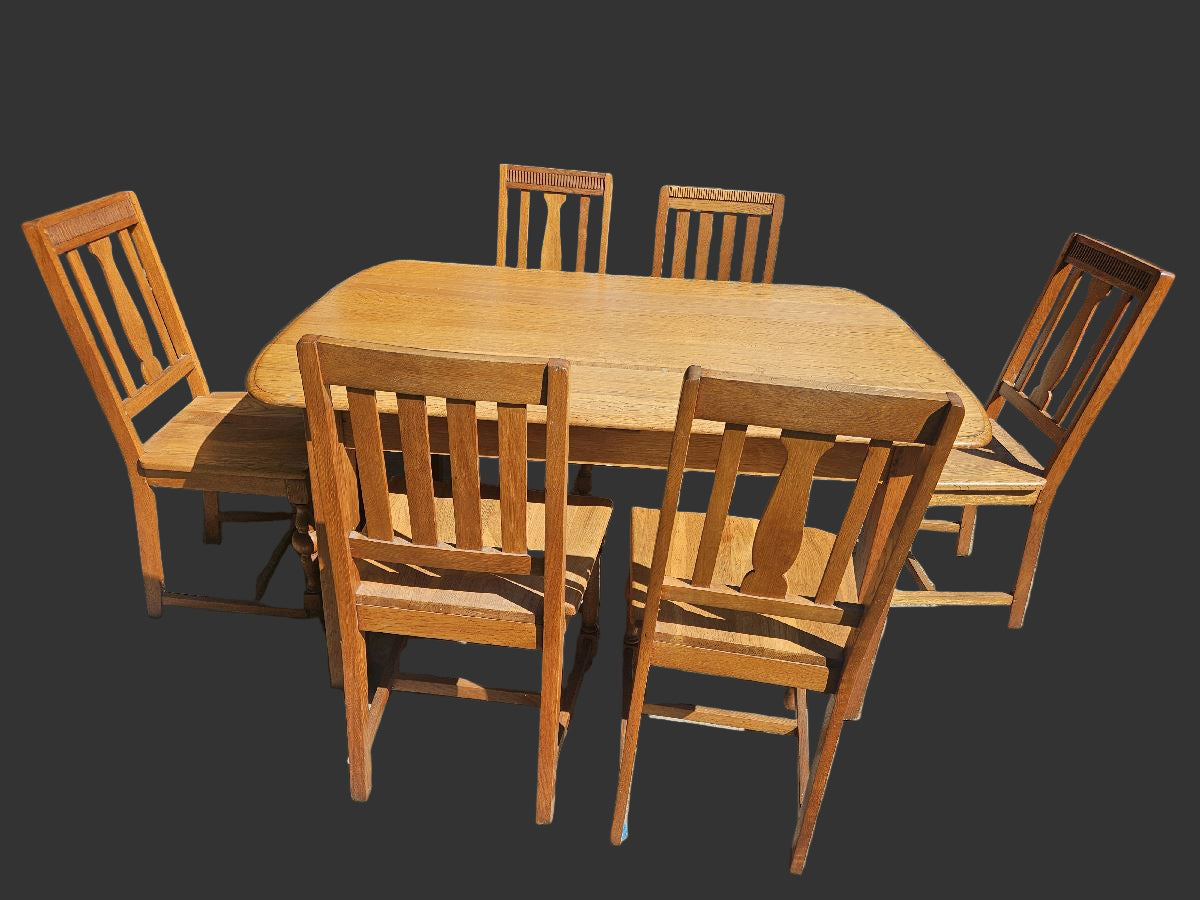 Oak dining room table and 6 chairs