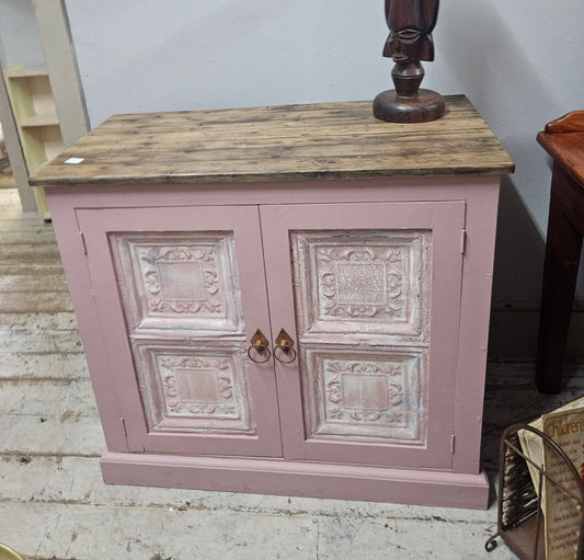 Base cabinet with iron paneled doors