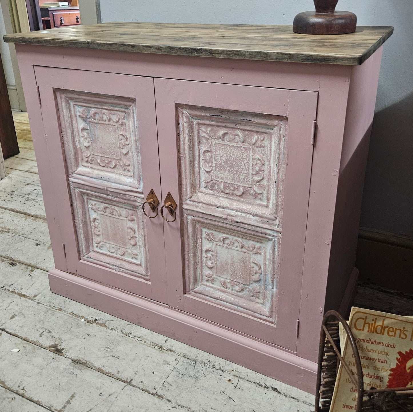Base cabinet with iron paneled doors