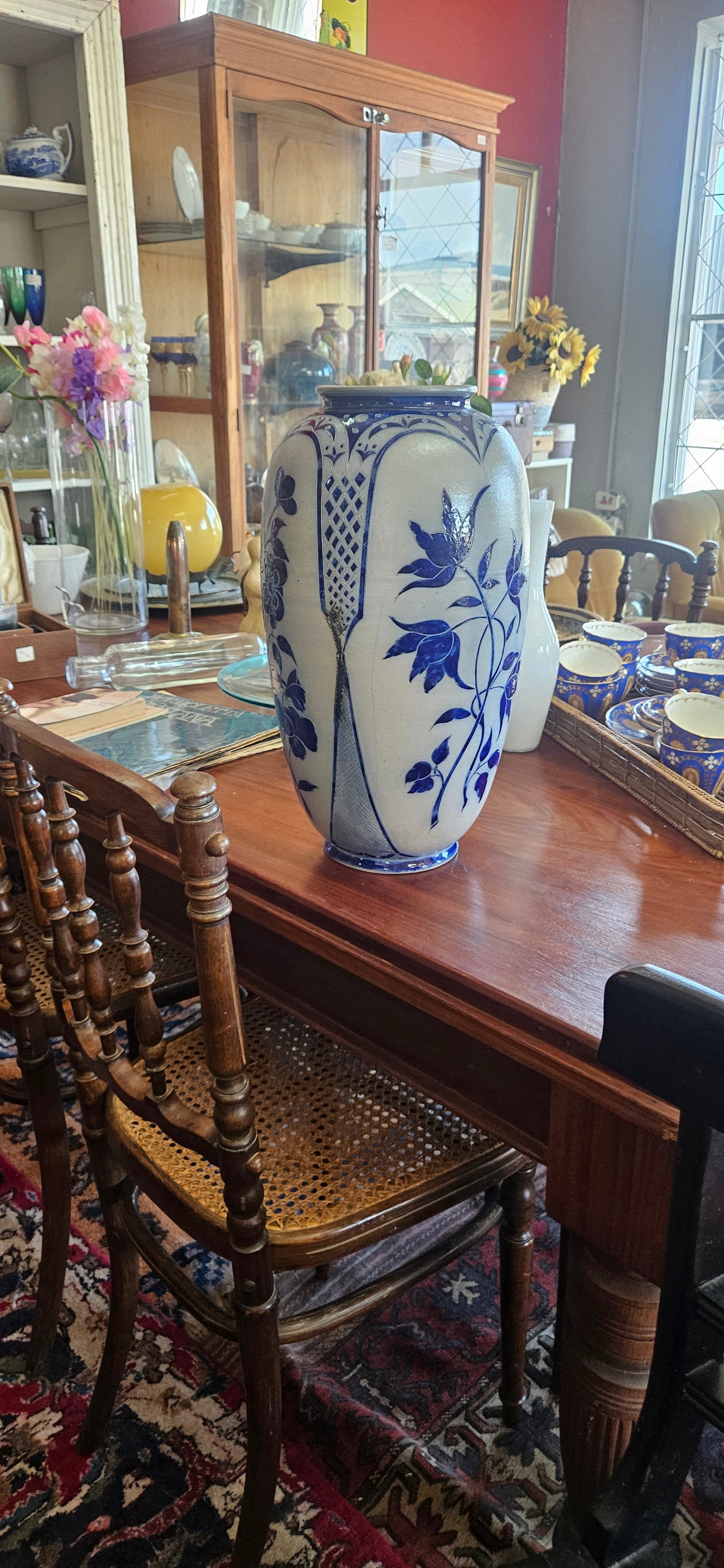 Tall blue and white vase
