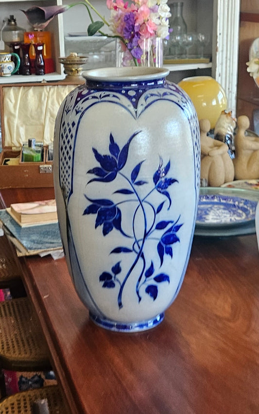 Tall blue and white vase
