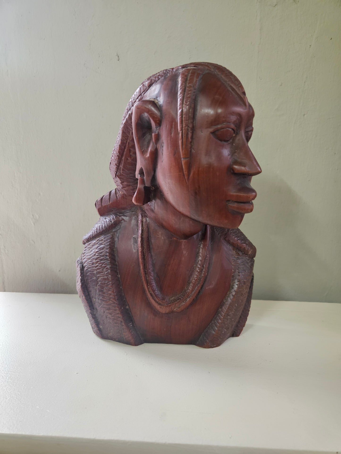 Carved wooden bust
